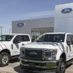 Richmond – Circa April 2022: Used Ford F-350 display at a dealership. With supply issues, Ford is buying and selling many pre-owned cars to meet demand.